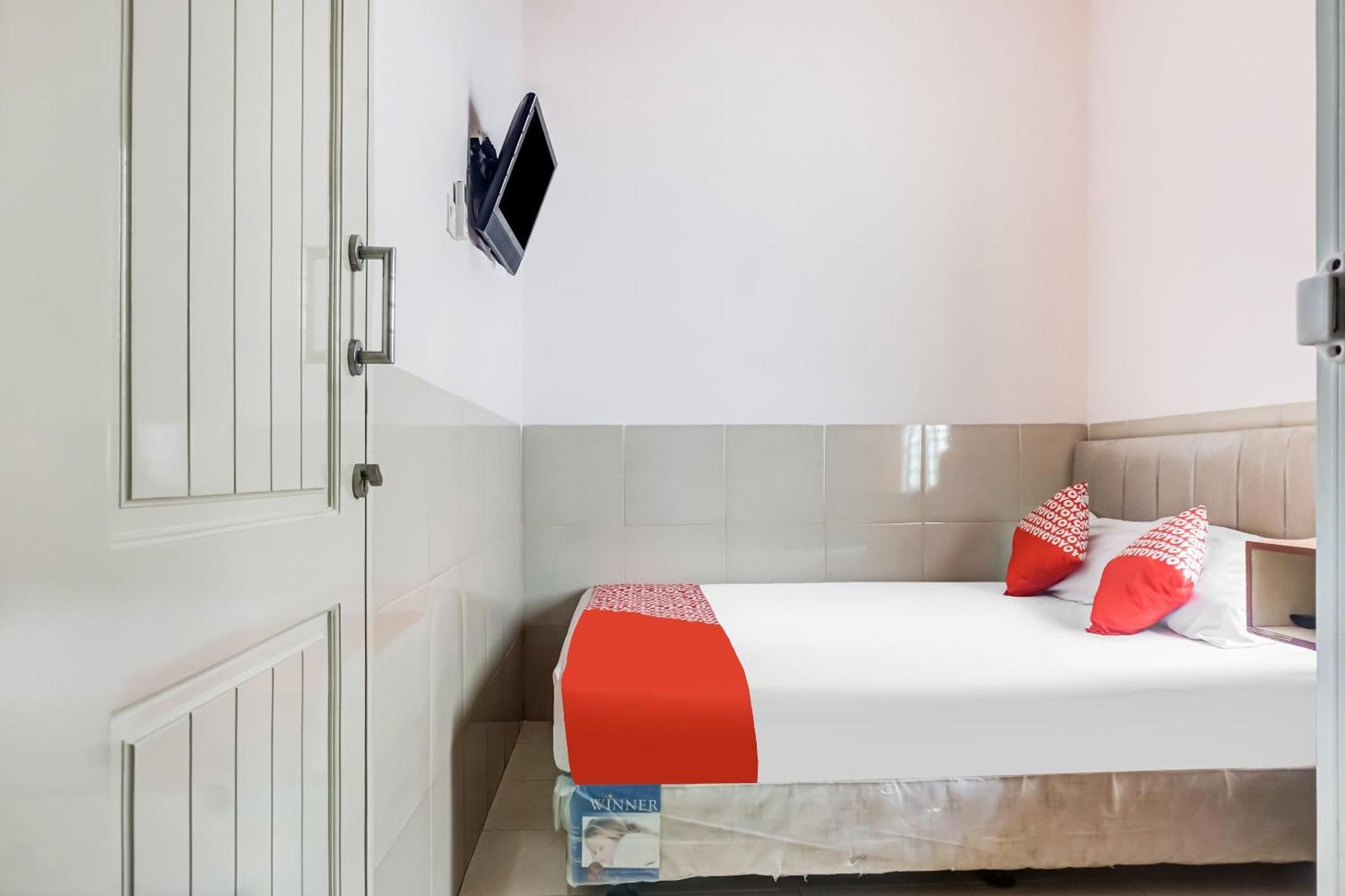 Oyo 91316 Hh Hotel Makassar
